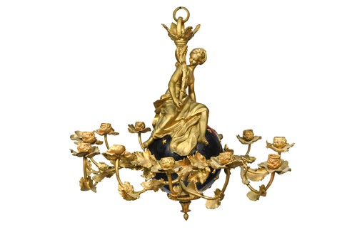 Lot 410 - A French gilt and bronze fifteen light chandelier, 19th century