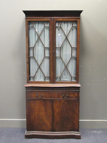 Lot 615 - A mahogany cabinet of Georgian design, the...
