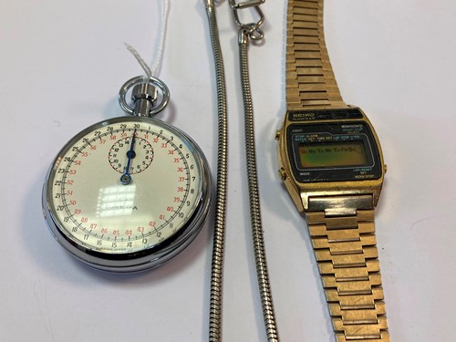 Lot 224 - An Omega stop watch together with a Seiko LCD...