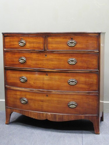 Lot 489 - An early 19th century mahogany bowfronted...