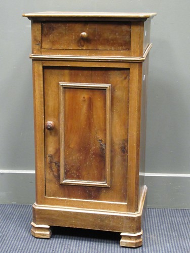 Lot 477 - An early 20th century walnut bedside cabinet,...