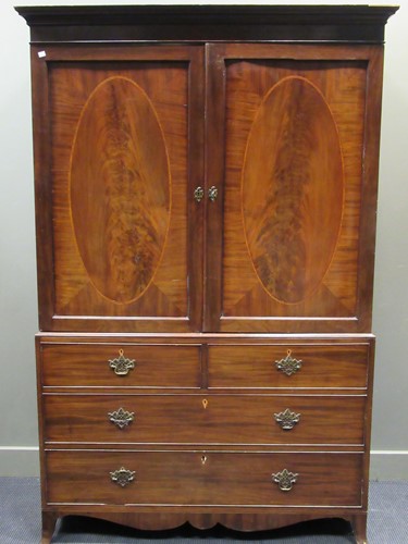 Lot 532 - A 19th century mahogany linen press with 3...