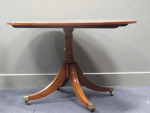 Lot 608 - A Georgian style crossbanded mahogany oval top...