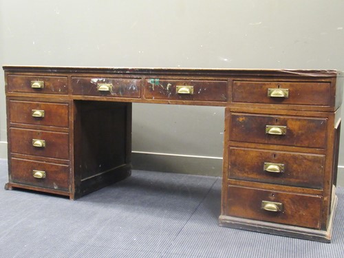 Lot 576 - A large mahogany pedestal desk, fitted with...