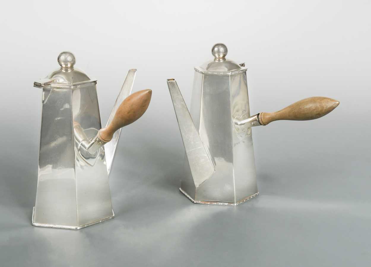 Lot 441 - A two piece Art Deco style silver plated café au lait set