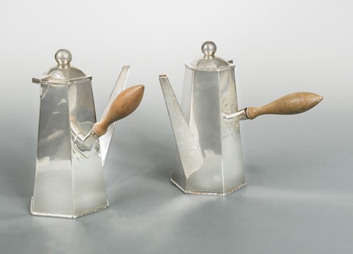 Lot 441 - A two piece Art Deco style silver plated café au lait set