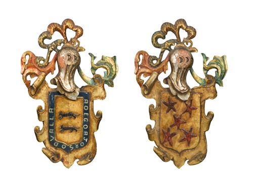 Lot 191 - A pair of carved and painted wooden coats of arms, late 19th / early 20th century