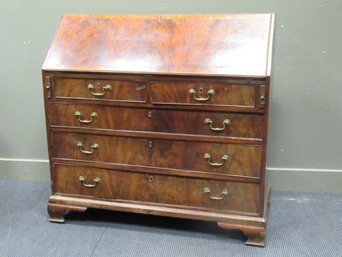 Lot 511 - A George III mahogany bureau with good fitted...