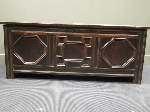 Lot 469 - An 18th century oak three panel coffer with...