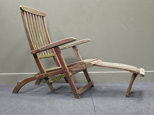Lot 701 - A green painted garden bench 130cm wide...