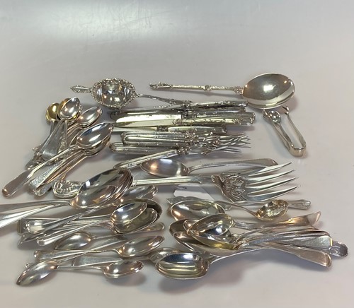 Lot 250 - A collection of assorted silver flatware....