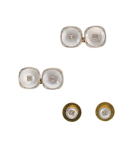 Lot 158 - A set of diamond cufflinks and dress studs