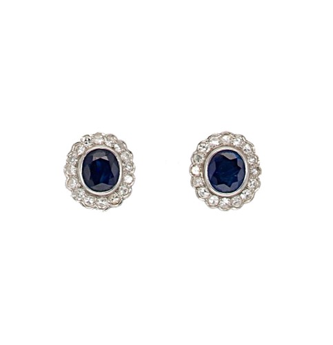 Lot 118 - A pair of sapphire and diamond cluster ear studs