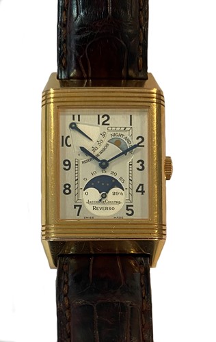 Lot 297 - Jaeger-LeCoultre - An 18ct gold 'Reverso Sun and Moon' wristwatch