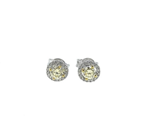 Lot 202 - A pair of halo style diamond ear studs