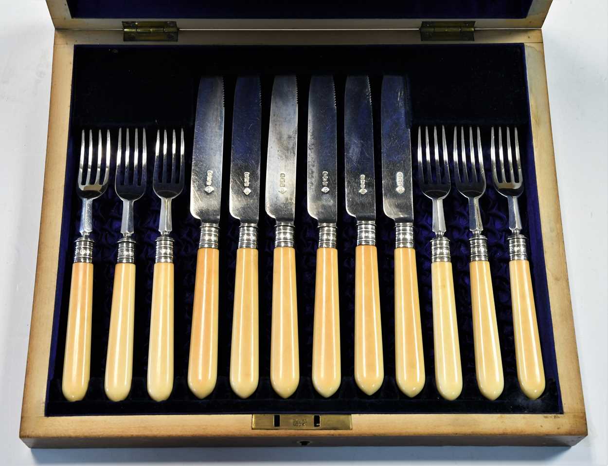 Lot 506 - A cased set of six pairs of Victorian silver fruit eaters