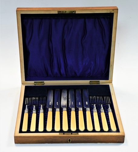 Lot 506 - A cased set of six pairs of Victorian silver fruit eaters