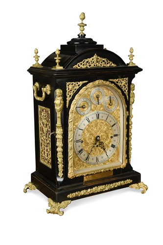 Lot 438 - A Victorian ebonised and gilt metal mounted table clock, circa 1887