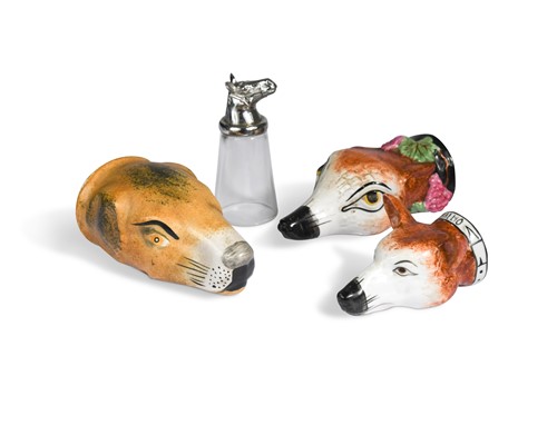 Lot 504 - A Staffordshire fox head stirrup cup, circa 1820