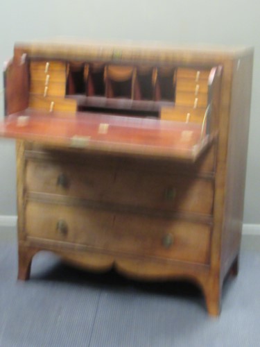 Lot 677 - An early 19th century mahogany secetaire, the...