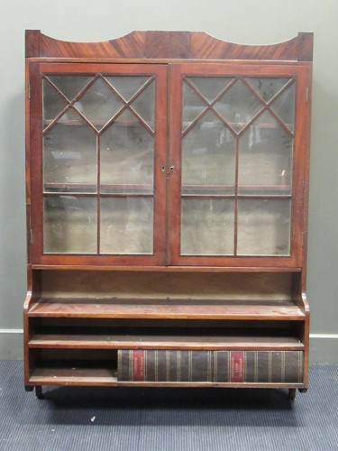 Lot 664 - A 19th century wall mounted mahogany bookcase...