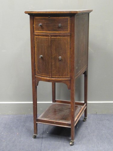 Lot 676 - An Edwardian inaid bow front cabinet together...