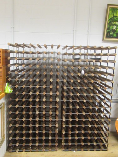 Lot 686 - A pair of 112 bottle wine racks with joining...
