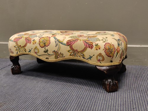 Lot 724 - A 20th century footstool on claw and ball feet,...