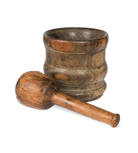 Lot 192 - A turned lignum vitae pestle and mortar,  late 18th or early 19th century