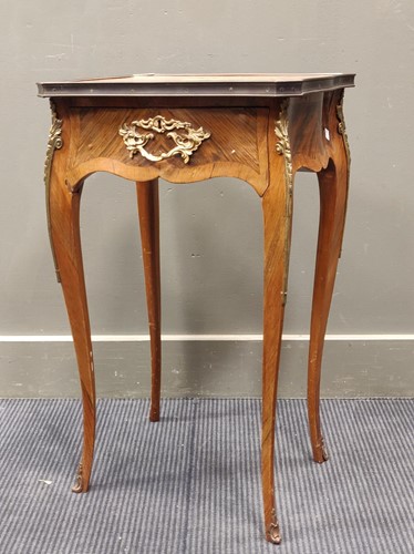 Lot 652 - A Louis XV style kingwood banded rosewood...