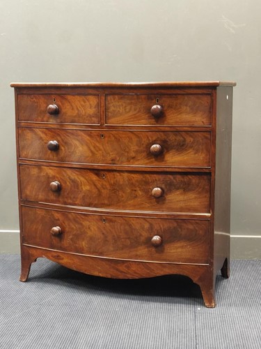 Lot 743 - A Regency mahogany bow-front chest of drawers,...