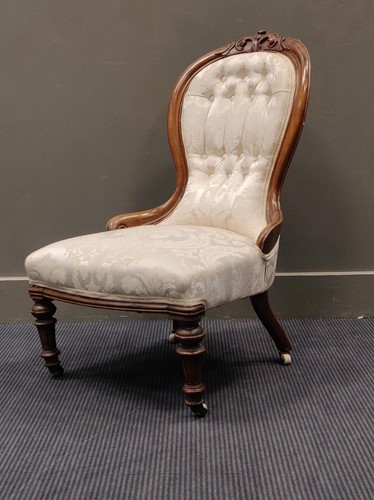 Lot 670 - A late Victorian button back armchair, and a...