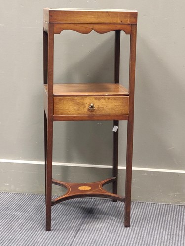 Lot 723 - A mahogany three tier square wash stand with...