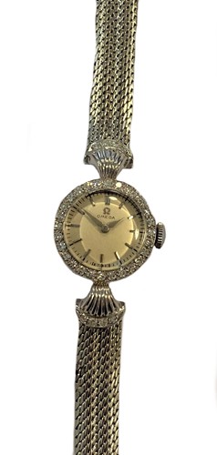 Lot 310 - Omega - An 18ct gold diamond set wristwatch