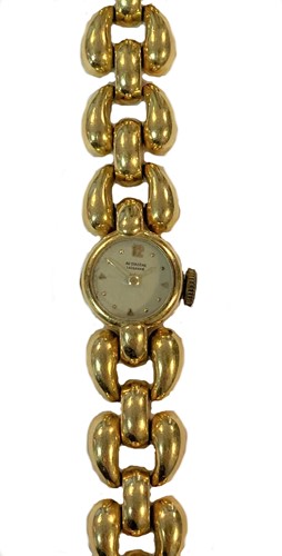 Lot 286 - Unsigned, retailed by Au Diadème, Lausanne - An 18ct gold wristwatch with bracelet by Gay Frères