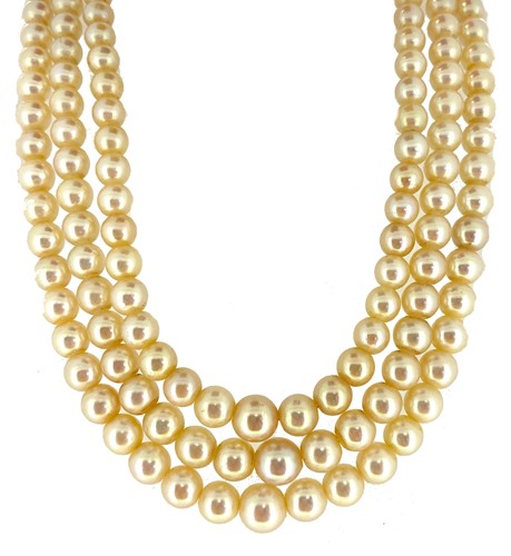 Lot 182 - A triple row necklace of cultured pearls with a diamond and sapphire clasp