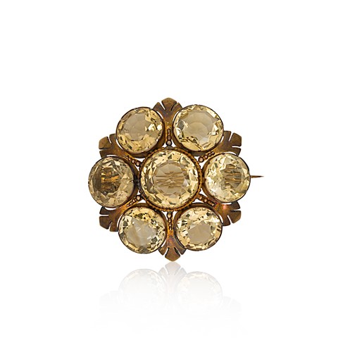 Lot 60 - A Victorian citrine set boss brooch