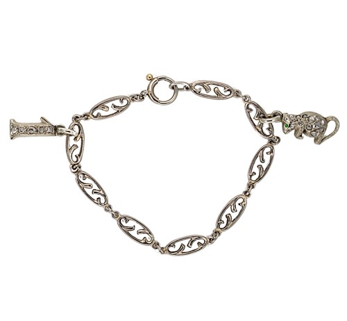 Lot 127 - An early 20th century diamond set child's charm bracelet