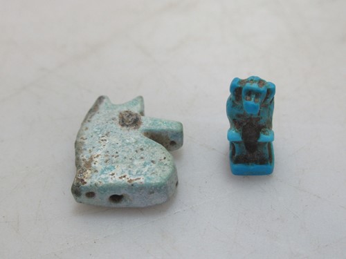 Lot 206 - A glass figure of the god Thor, 1cm high; a...