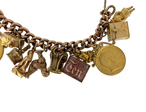 Lot 151 - A late 20th century rose gold charm bracelet with charms
