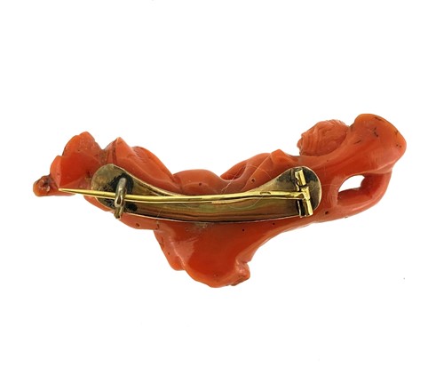 Lot 28 - A 19th century carved coral brooch