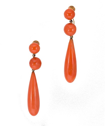Lot 29 - A pair of coral ear pendants together with a coral ring