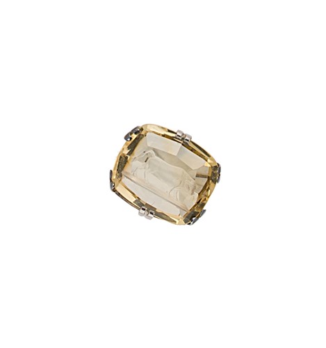 Lot 57 - A citrine intaglio ring