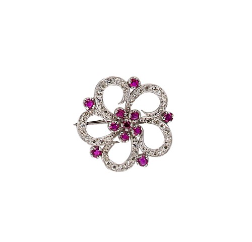 Lot 160 - A ruby and diamond set floral brooch