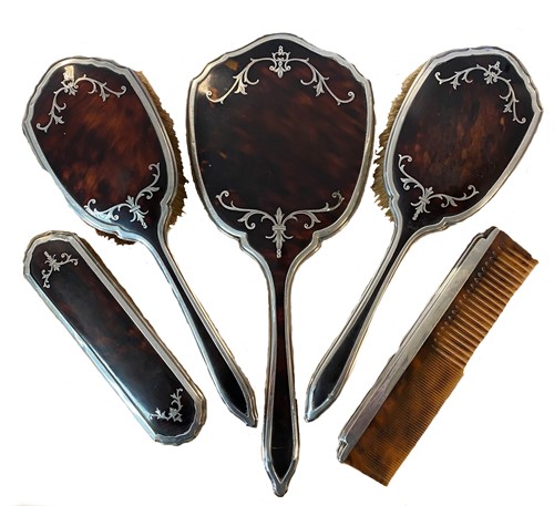 Lot 401 - An early 20th century silver backed 5-piece dressing table set with tortoiseshell inlay