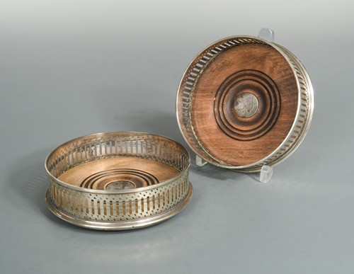 Lot 577 - A pair of 20th century silver bottle coasters