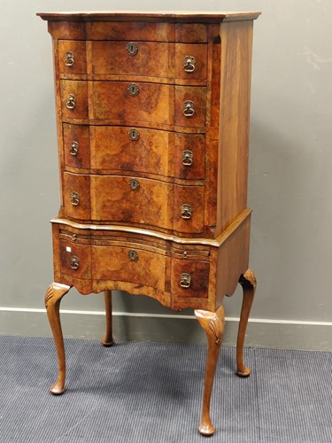 Lot 671 - A late 19th century walnut chest on stand...