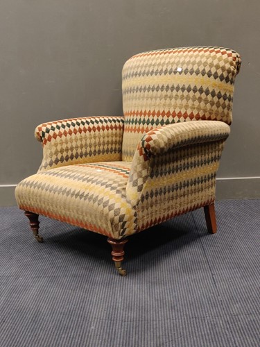 Lot 748 - A Howard style armchair upholstered in check...