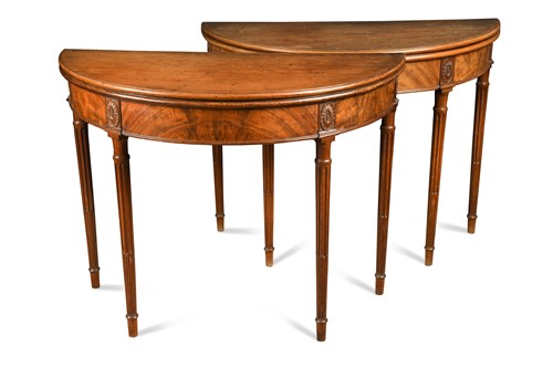 Lot 245 - A pair of George III mahogany demi-lune card tables