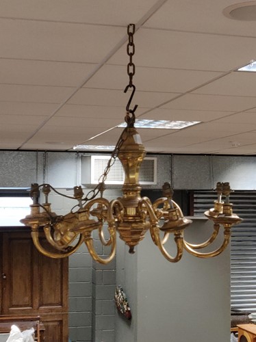 Lot 756 - An 8 branch brass electrolier 50 x 78cm